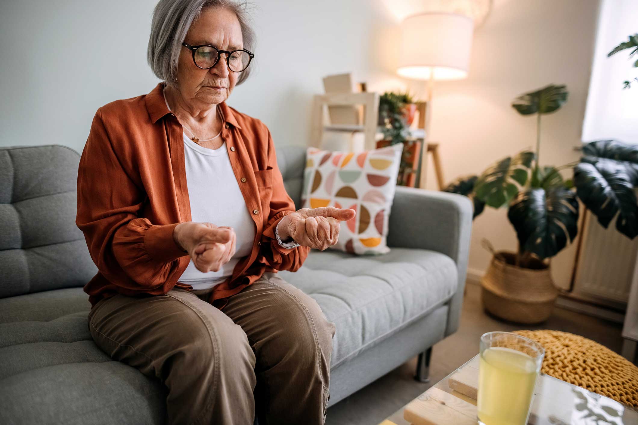 Woman experiencing chronic pain with arthritis