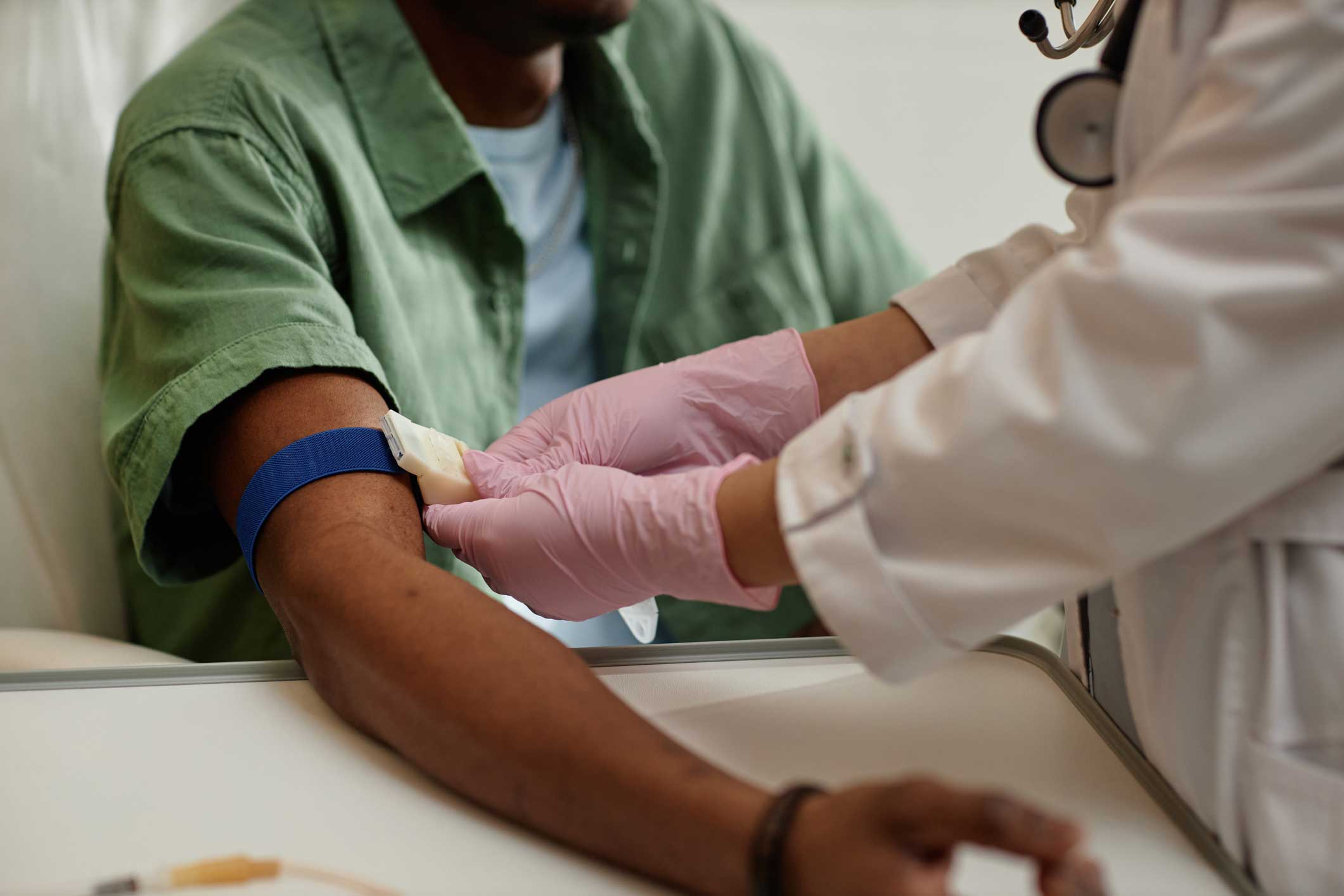 Patient having blood taken for laboratory tests